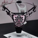 Butterfly mesh thong with low rise fit, sheer embroidery, and adjustable strap detail