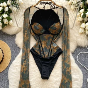 printed mesh bodysuit with halter lace-up neckline and sheer long sleeves