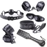 Ultimate Bondage Kit with PU leather cuffs, collar, blindfold, paddle, chain details, and matching roleplay accessories