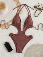 ring cut out monokini with halter neckline and metal ring detail