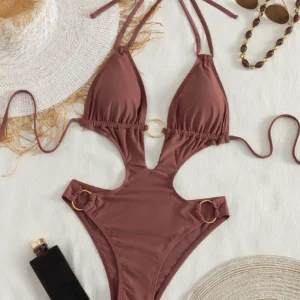 ring cut out monokini with halter neckline and metal ring detail