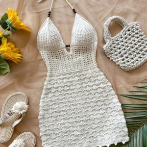 knitted V-neck mini dress with hollow out detail and wooden bead accents