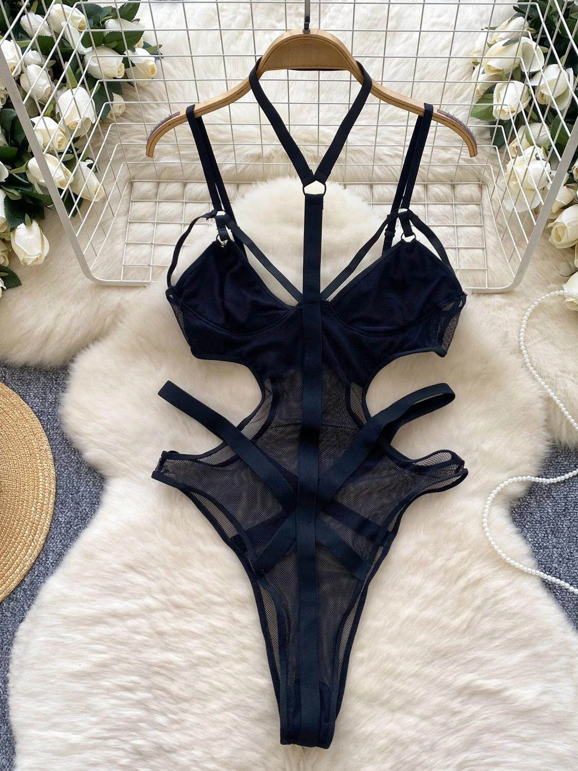 Cut Out Mesh Bodysuit cut out mesh bodysuit with sheer panels and strappy hollow out design