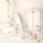 Bondage Restraint Set with white maid-inspired cuffs, collar, blindfold, chain detail, and ruffle accents