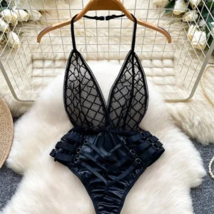 cross design playsuit with halter neckline and backless silhouette
