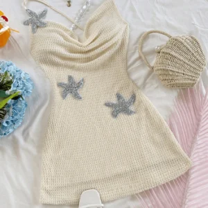 starfish halter mini dress with embroidered detail and backless silhouette