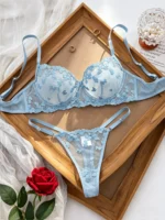 Blue Lace Bra Set with embroidered mesh cups, underwire support, matching thong, and romantic lingerie styling