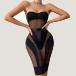 Sheer Bodycon Dress Set with strapless top, transparent mesh panels, fitted skirt effect, and sleek black styling