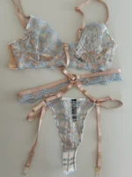 Patchwork Lace Bra Set with push-up bra, sheer thong, underwire support, and garter-style strap detail