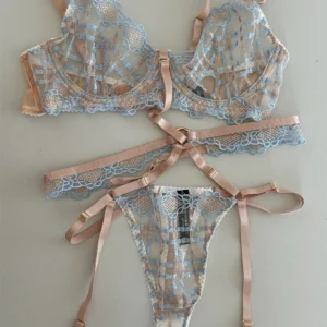 Patchwork Lace Bra Set with push-up bra, sheer thong, underwire support, and garter-style strap detail